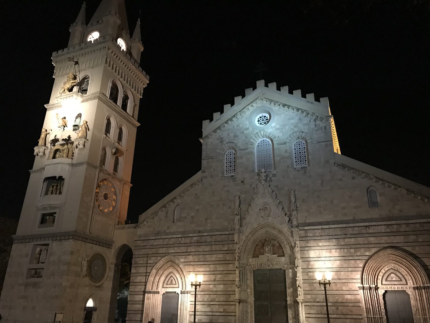 A historic Sicilian church illuminated at night